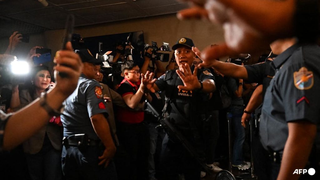 Philippine president calls emergency meeting after chaos and shooting at Senate