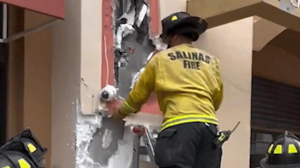 California officers rescue suspected burglar trapped in wall for 10 hours