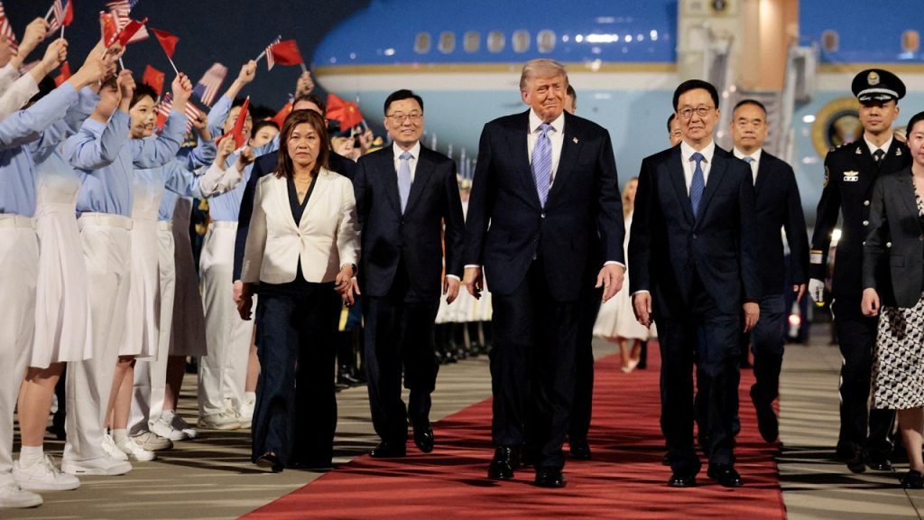 Trump arrives in Beijing for high-stakes trade talks with Xi Jinping