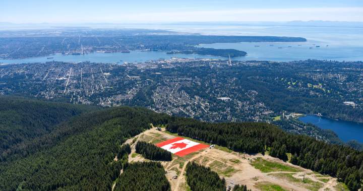 Grouse Mountain unveils giant Canadian flag as FIFA World Cup set to begin – BC