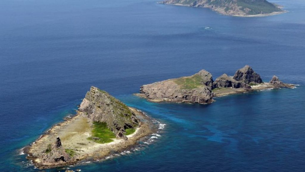 Japan, China coast guards face off near disputed islands