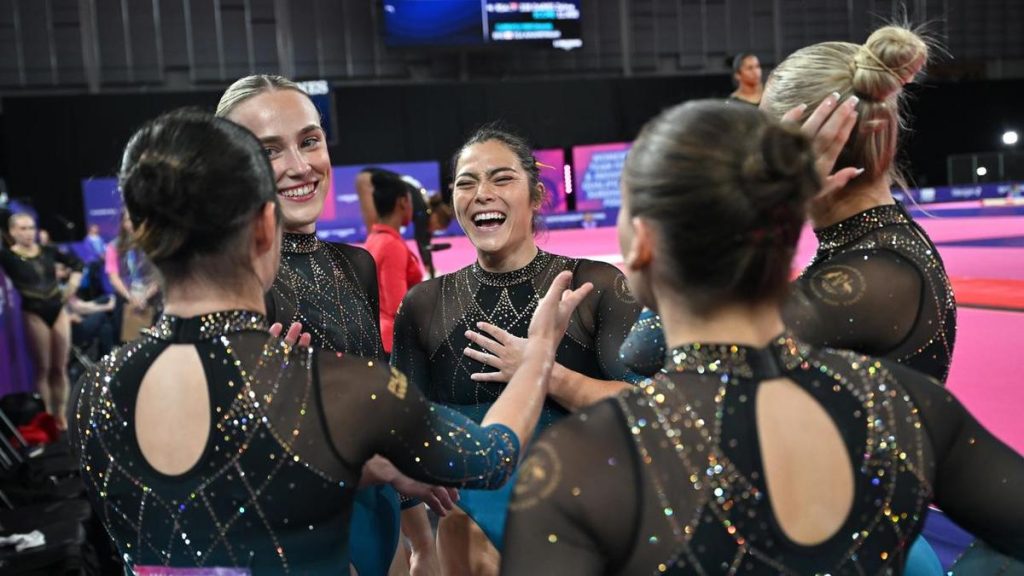 Emotional Godwin makes history as Aussies win gold