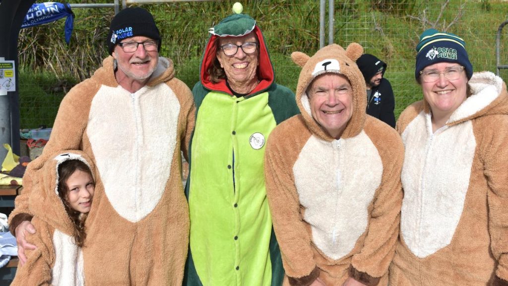 IN PICTURES: Emergency services brave the icy water to jump in for the annual Polar Plunge at Middleton Beach