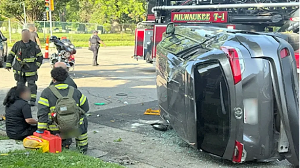 ICE agents in Milwaukee pause arrest to rescue rollover crash victim