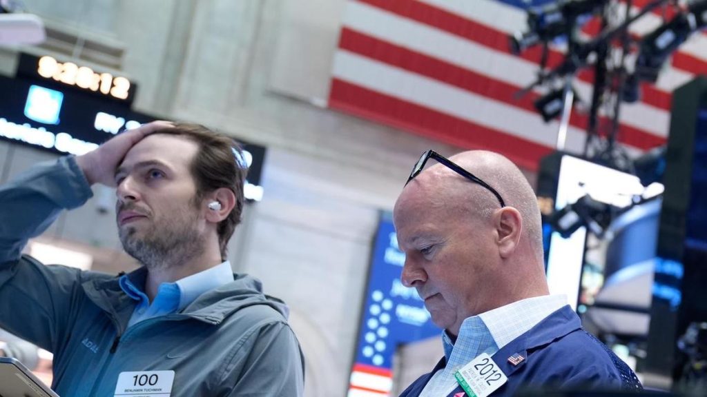 Wall St slips as tech earnings spark AI spending worry