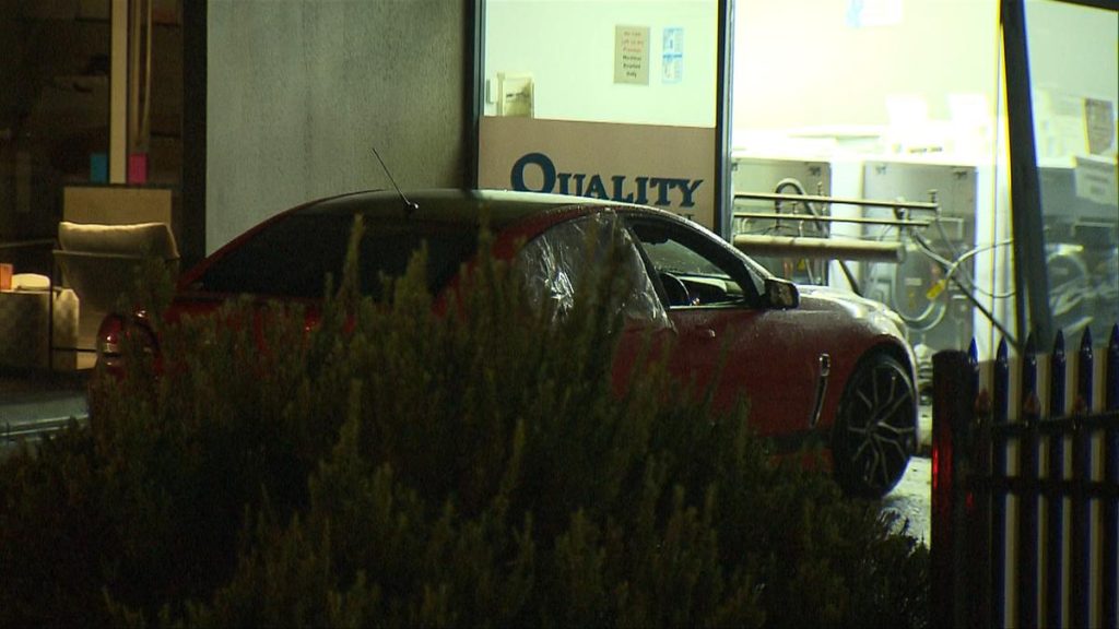 Woman accidentally set fire to clothes in laundromat, drove car into business to extinguish flames