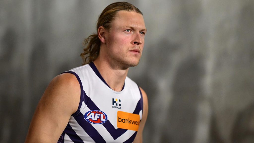 Former Fremantle Docker Lee Spurr says moving Hayden Young back to defence will protect his body