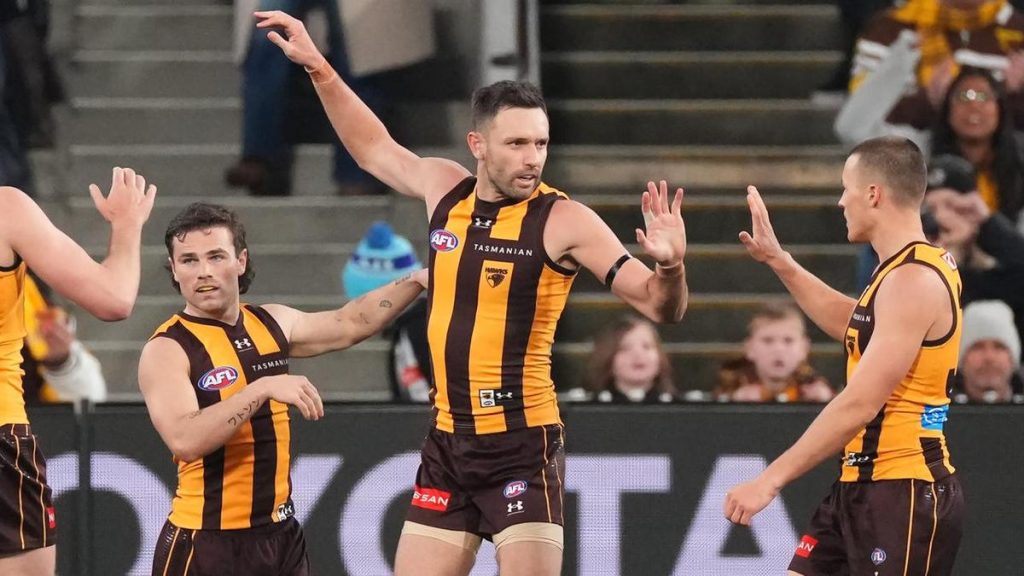 'Grumpy' Gunston reaches 300 as a revered Hawk