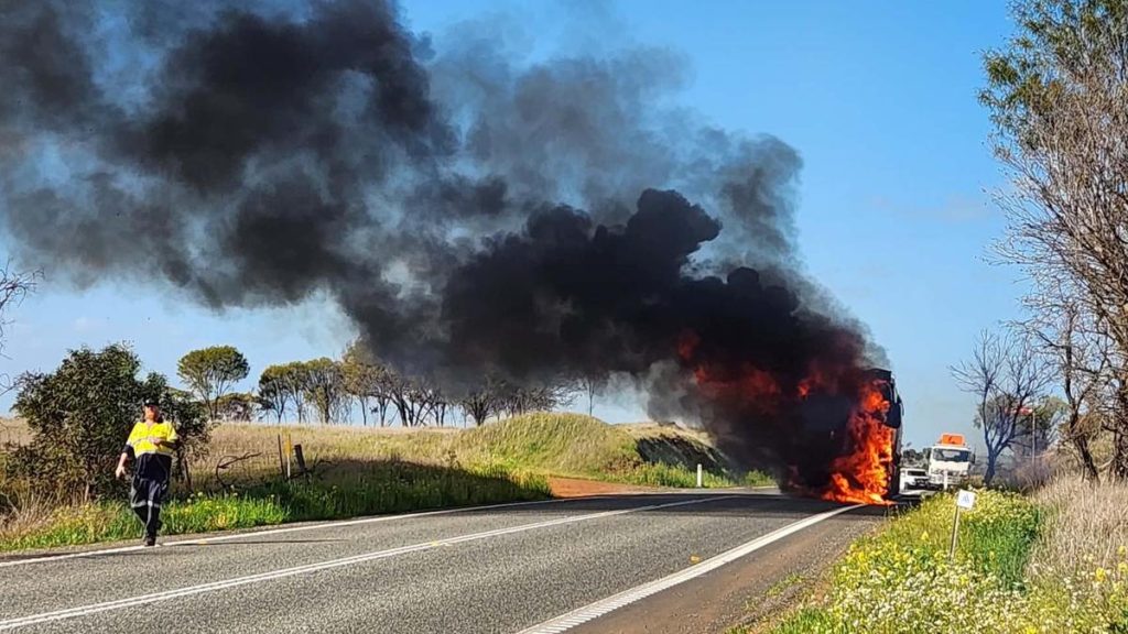 Lucky escape for truck driver after road train hauling grain bursts into flames on Wagin-Dumbleyung Road