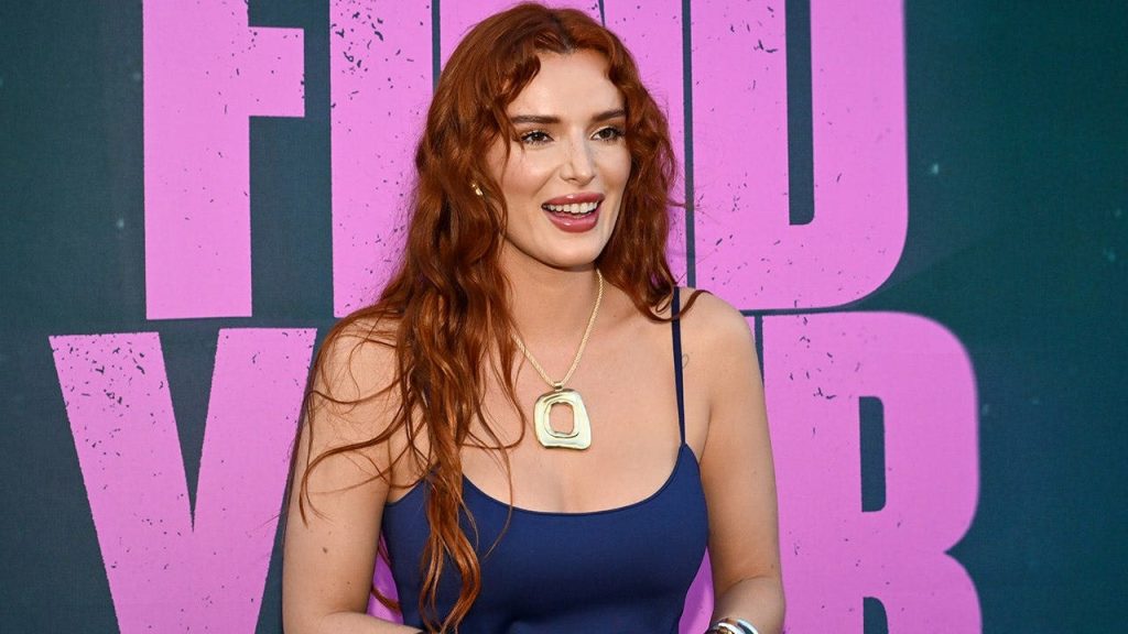 Bella Thorne hits the beach in green bikini with fiancé Mark Emms