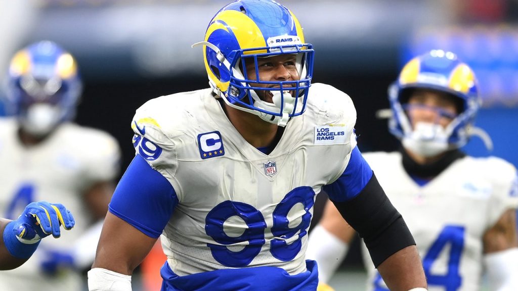 ‘We back’: Aaron Donald returns to the Rams and a defense now loaded with Myles Garrett and others