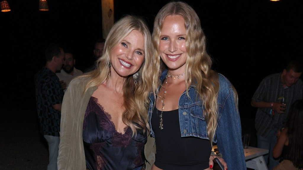Christie Brinkley and Sailor Brinkley Cook twin at John Mayer event