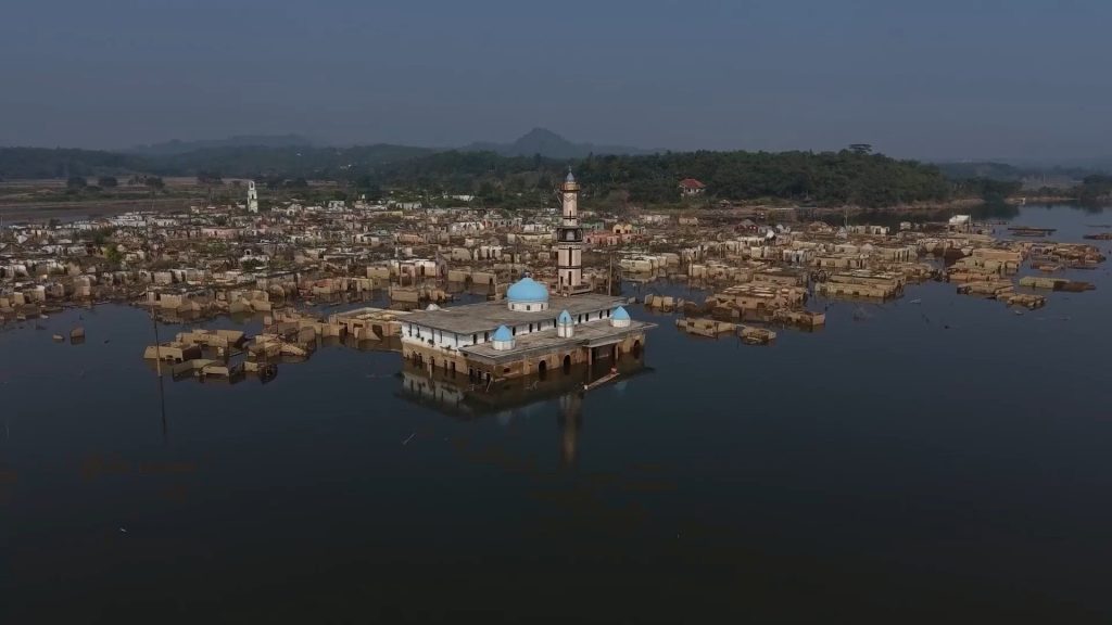 Submerged Indonesian village re-emerges as drought lowers water levels | Climate