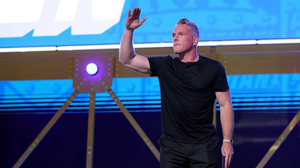 Pat McAfee threatens to sue liberal troll who accused him of using ‘N-word’ after sitting with Trump