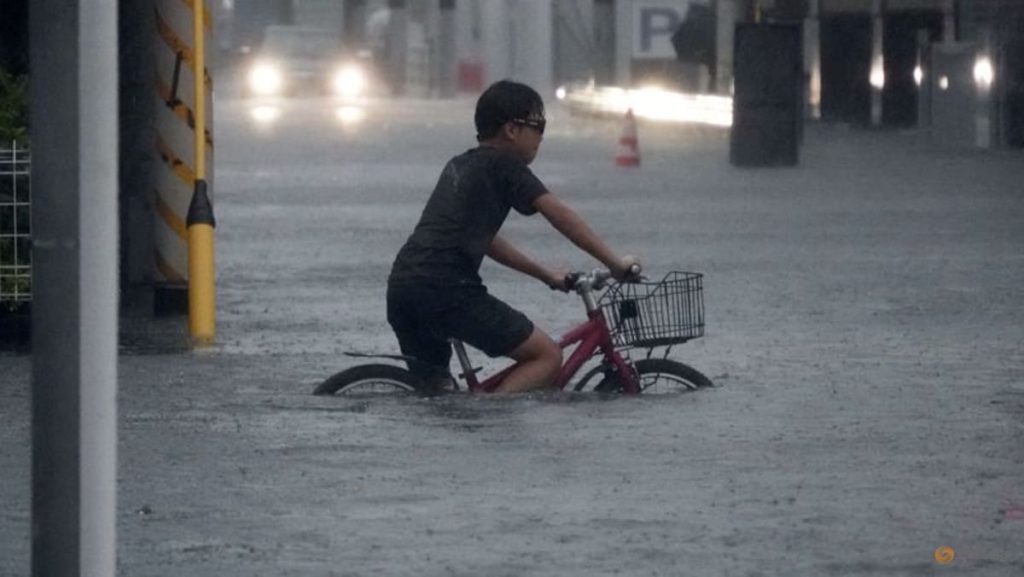 Flights scrapped, evacuations urged as Typhoon Dujuan wallops Japan