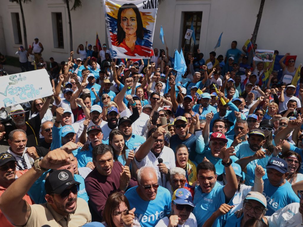 Venezuelans rally for opposition leader’s return and presidential elections | Elections News