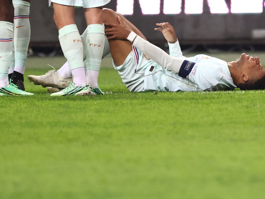 Kylian Mbappe’s knee injury to keep him out for two weeks | Football