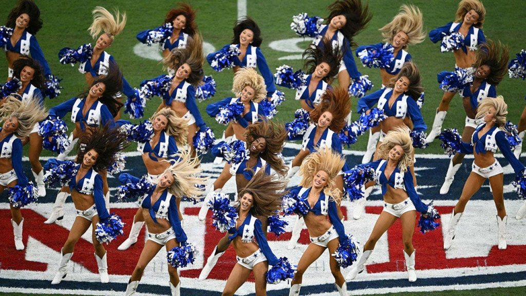 Dallas Cowboys cheerleaders have fun in Brazil despite crushing defeat, Browns fans fight & sad Michigan fans