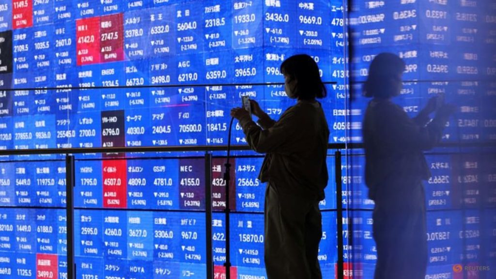 Asian shares track Wall Street higher; Treasury yields near multi-decade highs