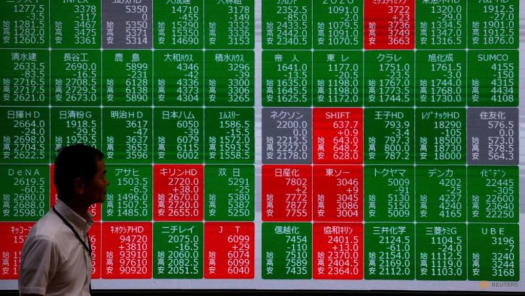 Shares seesaw in Asia as earnings loom, oil skids