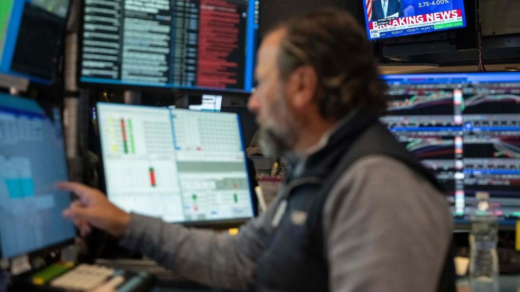 Wall St slides as Alphabet results revive AI cost fears
