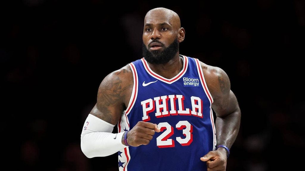 LeBron James doubles down with sneaky golf hip turns during national anthem after Trump’s ‘total disgrace’ dig