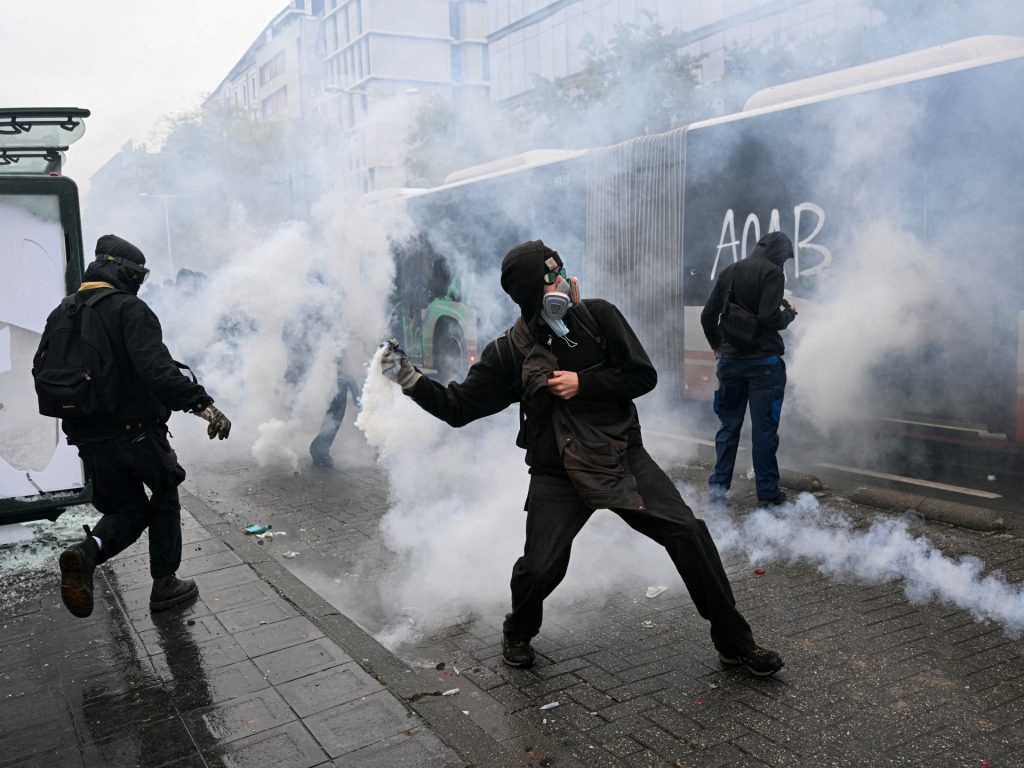 Thousands rally for anti-austerity protest in Brussels amid clashes | Protests News