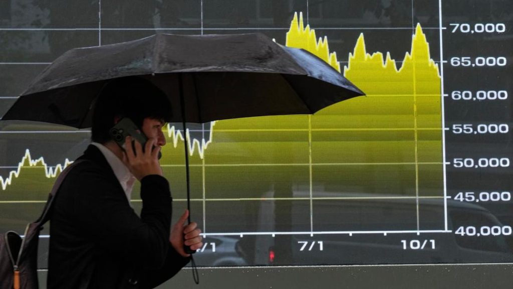 Asian stocks mixed as worries about AI grow