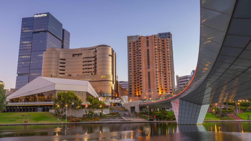 Three police officers jump into River Torrens to rescue man fleeing Adelaide brawl