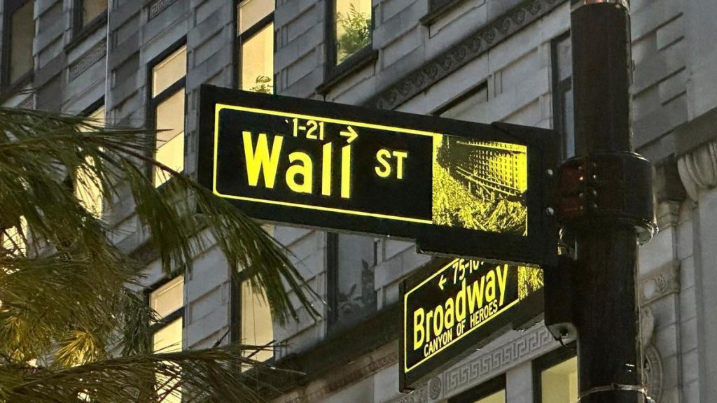 Nasdaq hits record high following softer jobs data