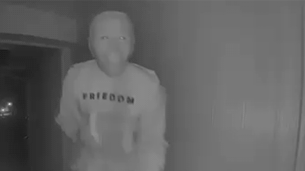 Biden mask-wearing visitor’s bizarre doorstep stunt caught on camera